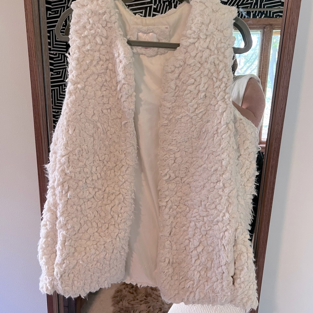White Sherpa vest.
